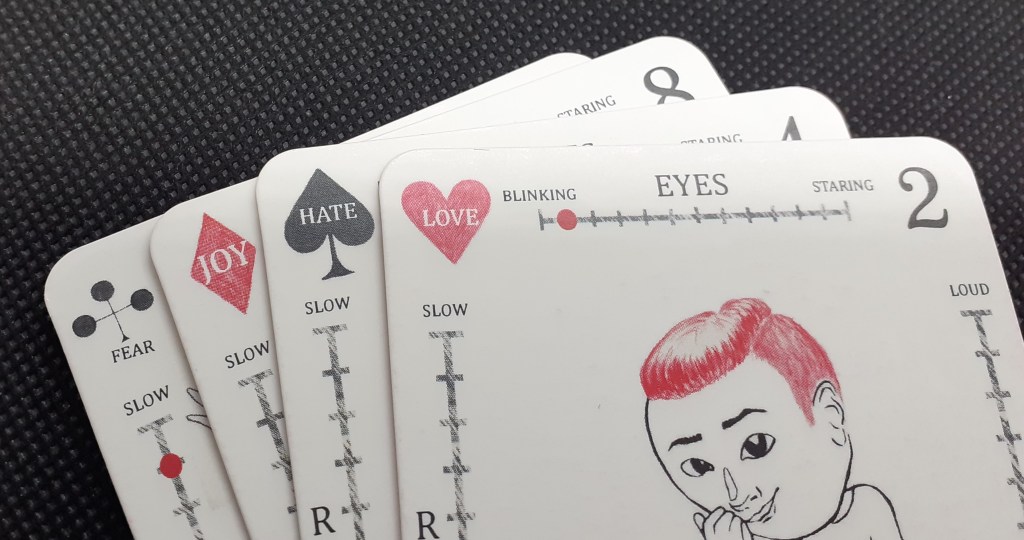 Neljä korttia, jotka edustavat kukin yhtä korttipakan maata. 